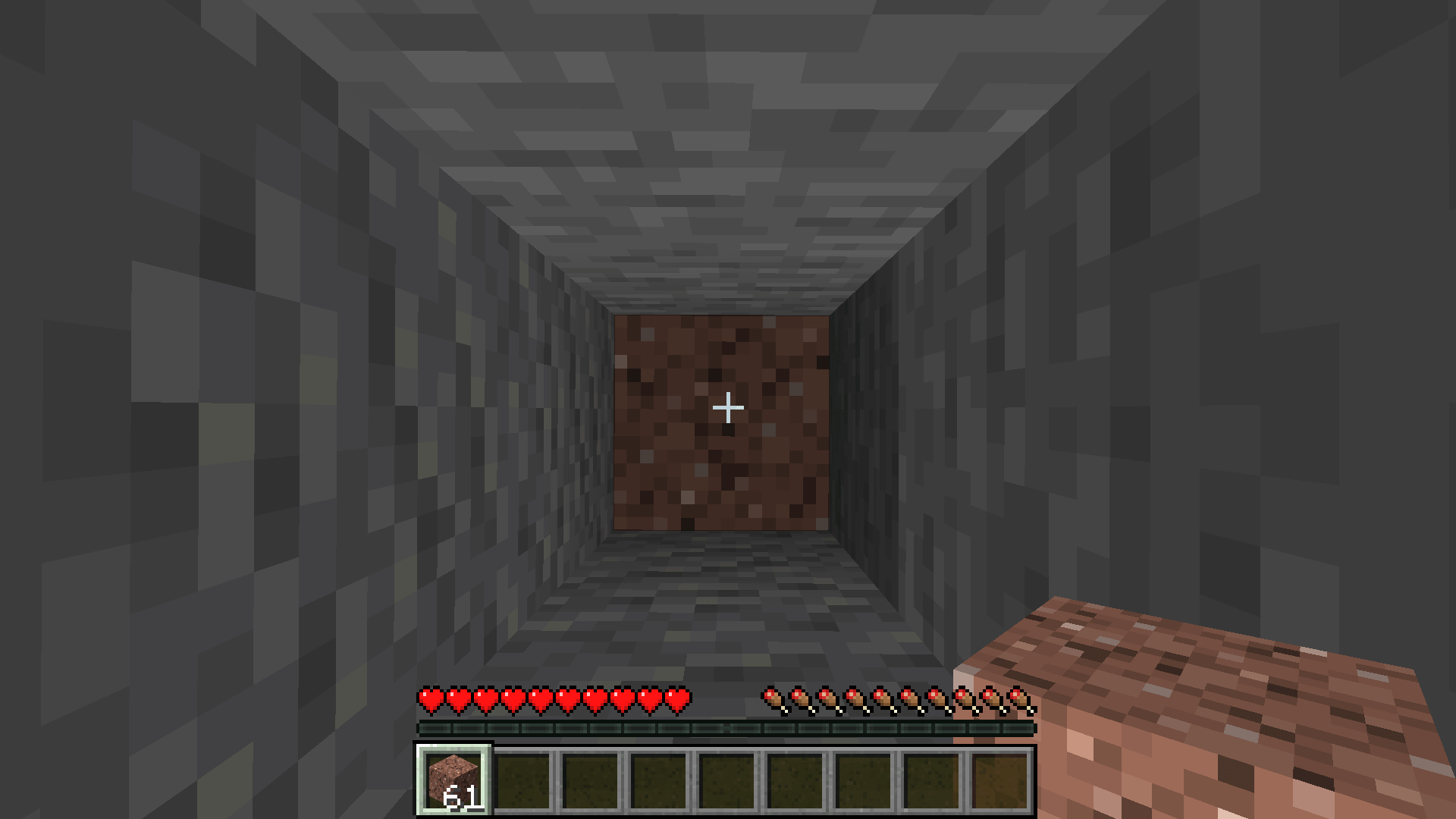 Metodo 1 per uscire dalla buca di Minecraft: costruirsi con i blocchi un pillar sotto i piedi.